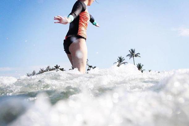a person riding skis down a snow covered slope